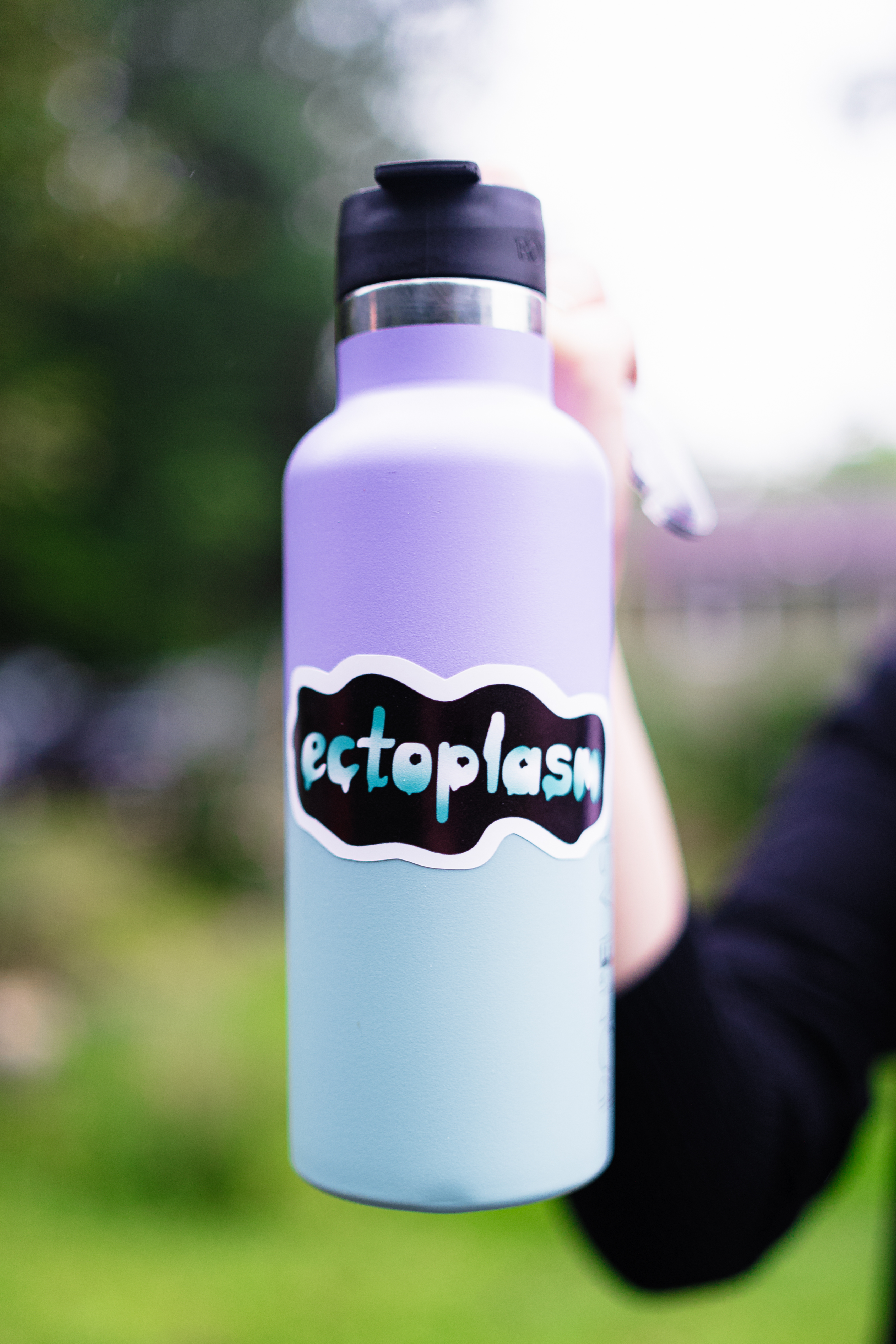 Water bottle with ectoplasm sticker on it.